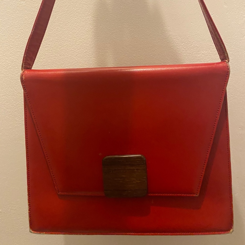 Vintage YSL red bag with wear (not authenticated)